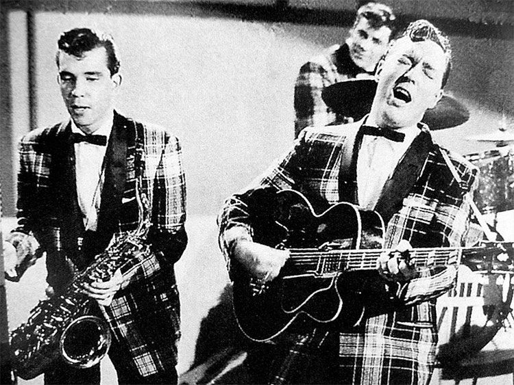 Bill Haley and his Comets performing "Rock Around the Clock" on TV in 1955