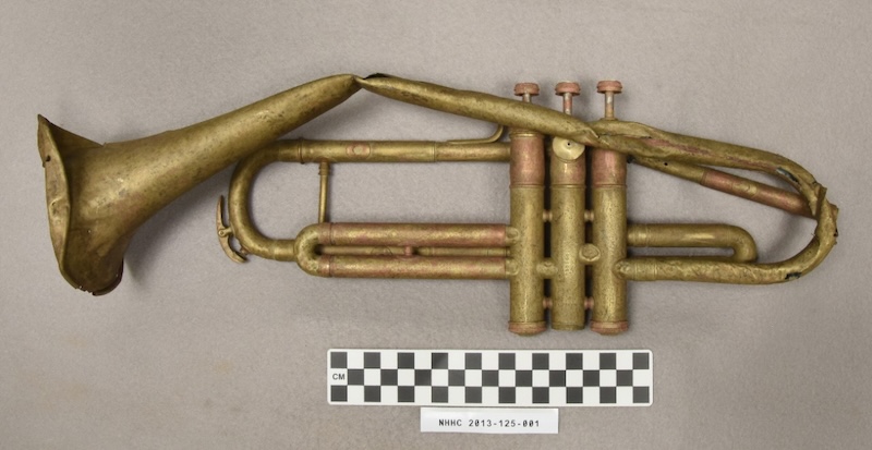 A trumpet recovered from the wreck of USS Houston. Naval History and Heritage Command. Public Domain.