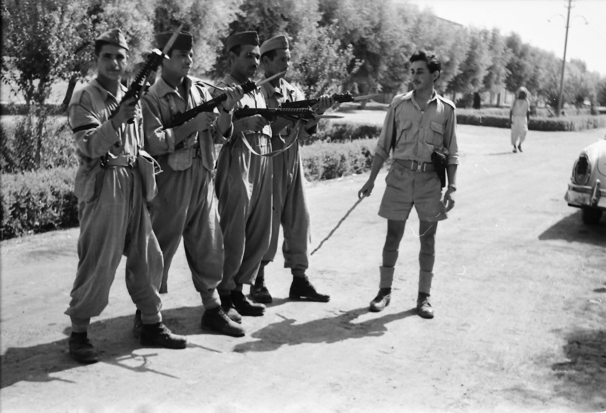 A group of Iraqi soldiers on the street, 1958. Museum of African Art (Belgrade). Public Domain.