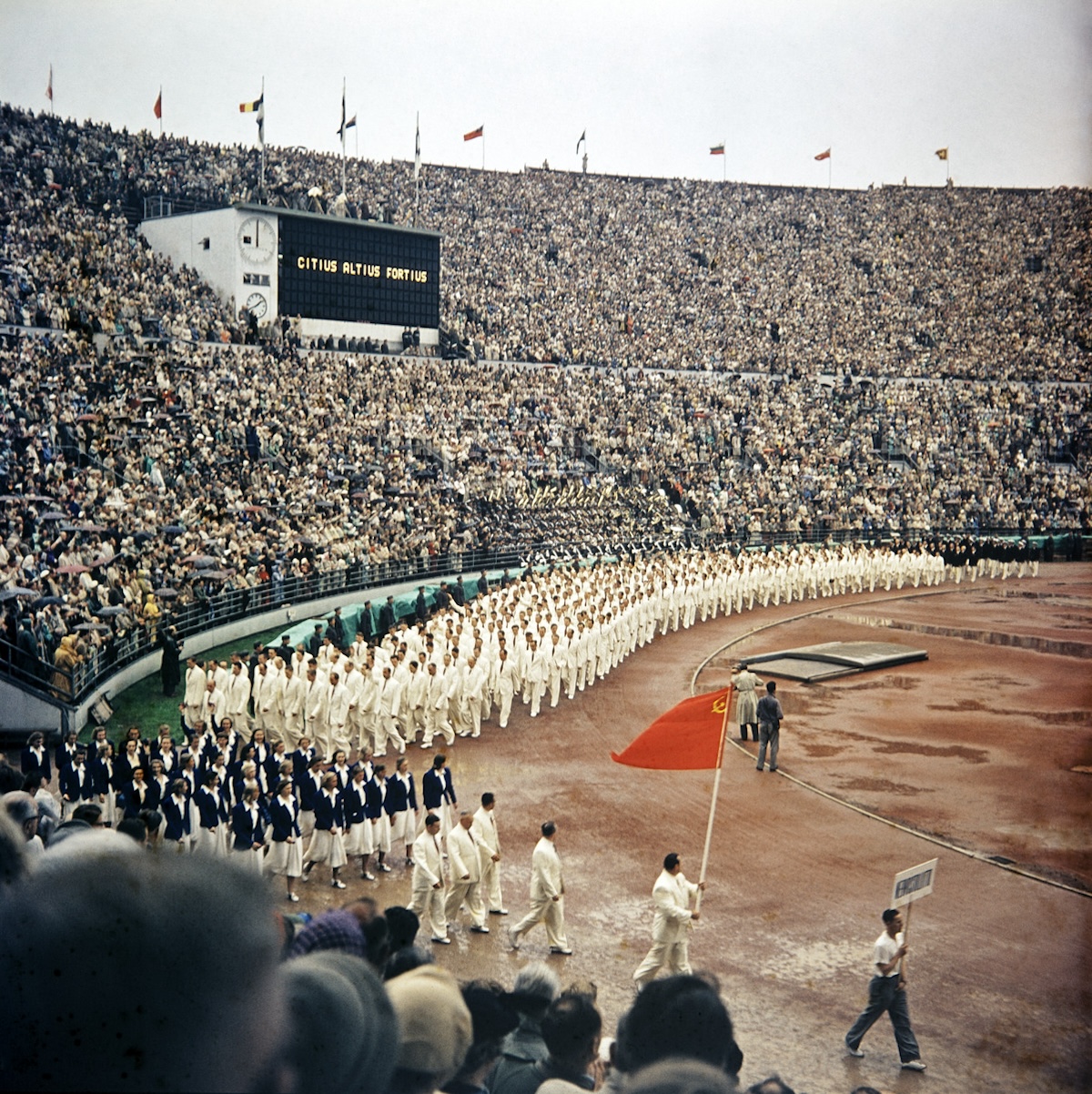 The Soviet Olympic team marches into the stadium at the opening of the 1952 Helsinki Olympics, the first one contested by the USSR. Helsinki City Museum (CC0).