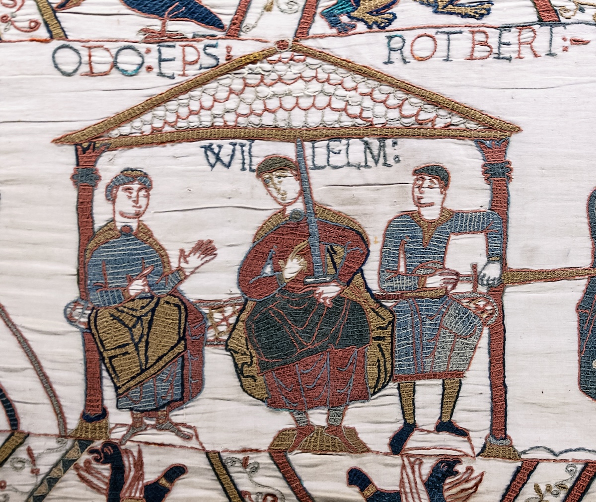 Duke William and his two half-brothers: to his right, Bishop Odo of Bayeux and to his left, Count Robert of Mortain, on the Bayeux Tapestry. Myrabella (CC0 1.0).