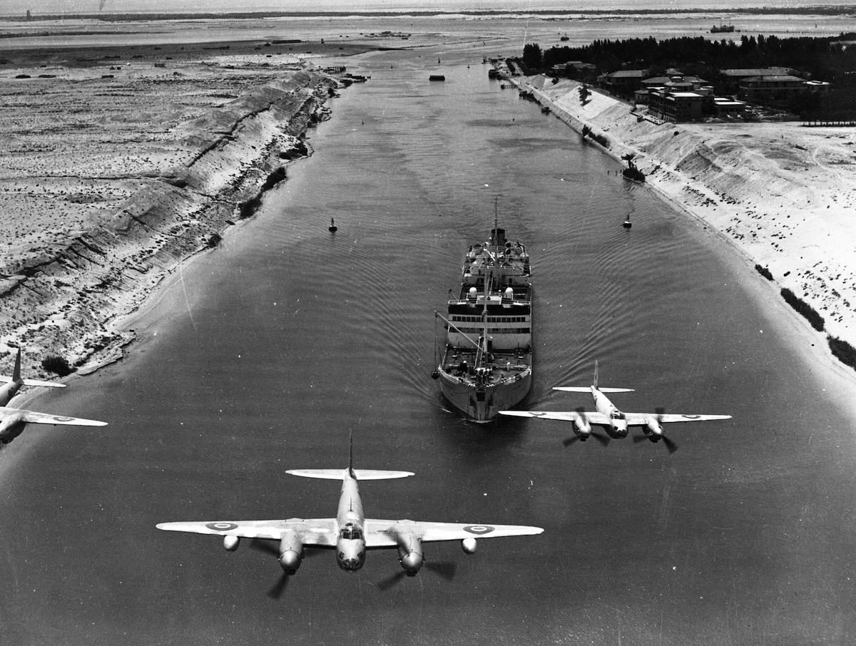 Egyptian air force planes above the Suez Canal, c. 1956. Libraries Tasmania. Public Domain.