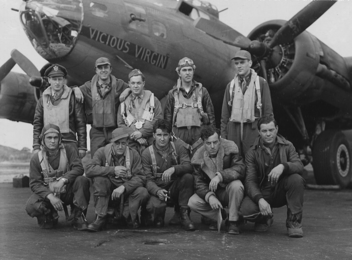 US bomber crew tasked with a raid over Heligoland pose in front of their B017 Flying Foretress, 29 July 1943. US National Archives. Public Domain.