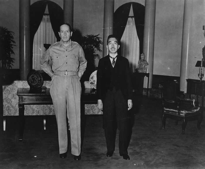 Emperor Hirohito and General Douglas MacArthur in the US embassy in Tokyo, 27 December 1945. US National Archives and Records Administration. Public Domain.