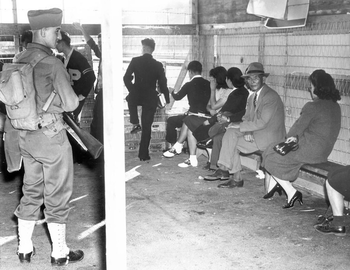 Japanese-Americans taken into custody from the Terminal Island ferry, 7 December 1941. University of Southern California.