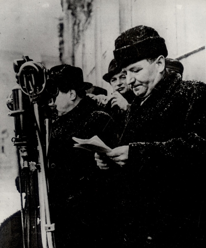 Klement Gottwald prepares to address the crowd during the Communist takeover of Czechoslovakia, February 1948. Moravian Library in Brno. Public Domain.