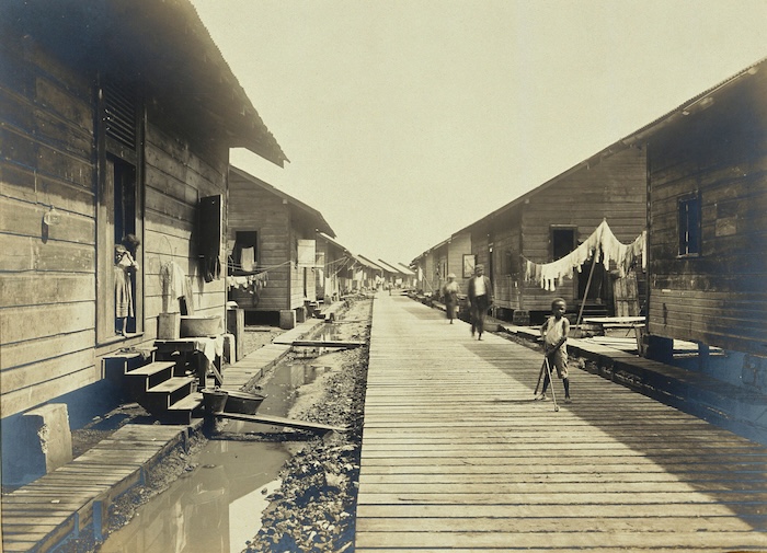 Wooden huts for workers on the Panama Canal at Cristobal, c. 1910. Wellcome Collection. Public Domain.