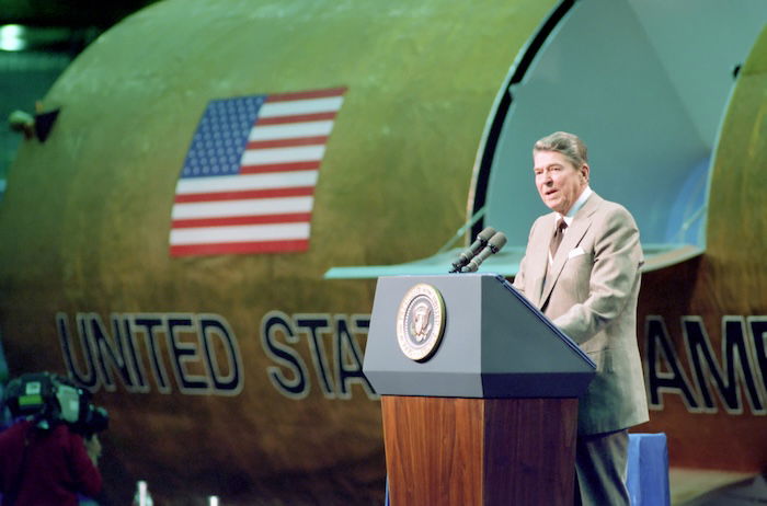 Ronald Reagan gives a speech on the Strategic Defense Initiative at Martin Marrietta Astronautics in Waterton, Colorado, 24 November 1987. US National Archives and Records Administratrion. Public Domain.