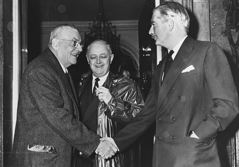 US secretary of state John Foster Dulles, French foreign Aafairs minister Christian Pineau., and British prime minister Anthony Eden outside 10 Downing Street, 2 August 1956.