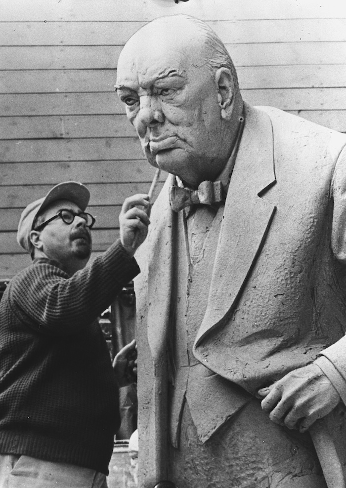 Sculptor David McFall in his studio working on a sculpture of Sir Winston Churchill, 8 December 1958. Nationaal Archief. Public Domain.