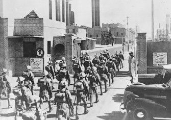 British Indian army soldiers march through the gates of the Iranian Oil Company, 25 March 1946. Nationaal Archief. Public Domain.