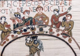 Bishop Odo blesses the food and wine, detail from the Bayeux Tapestry,  late 11th century. Bridgeman Images.