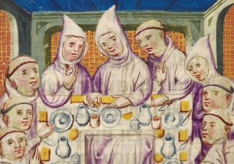 Carthusian monks at the dining table, from an account of rules of the Carthusian Order, the Netherlands, 15th century. British Library/Bridgeman Images.