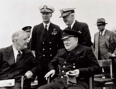 Roosevelt and Churchill seated on the quarterdeck  of HMS Prince of Wales,  10 August 1941. 